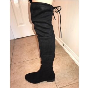 Over the knee black boots